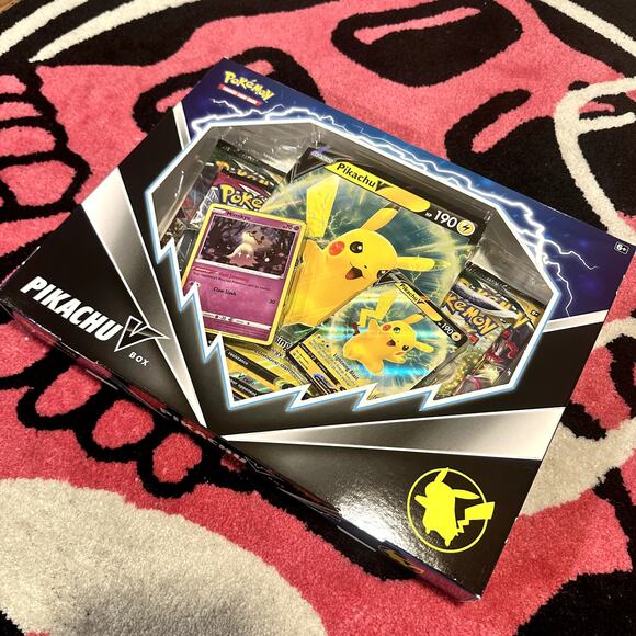 pokemon cards pikachu v box TCG: : Toys & Games the box includes a total of four booster packs to strengthen your deck Pikachu V-Union - Celebrations Special